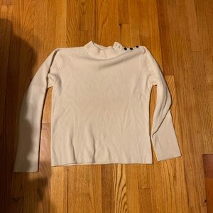 Off White sweater with buttons up the shoulder